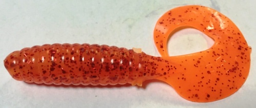 Twister Relax pomarańczowa  przeźroczysta z czerwonym brokatem  9 cm  sklep wędkarski makarfish 1.jpg